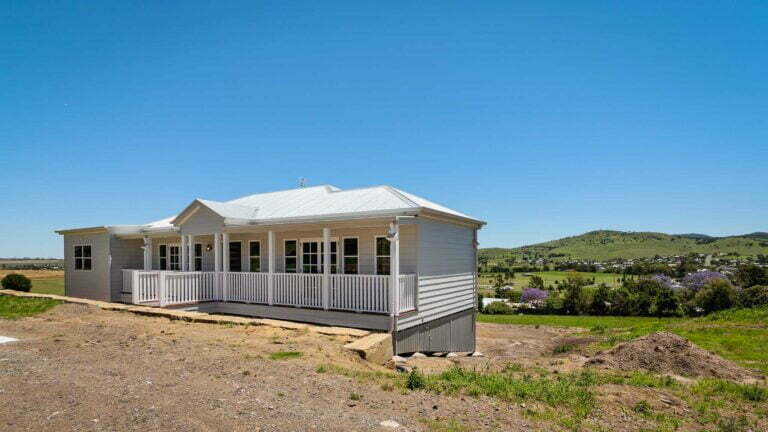 This Modern Colonial Home has been build on stumps to minimise costs of building on a sloped side. There is additional under house storage created by doing this.